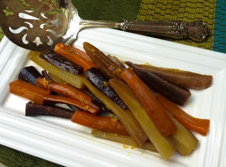 carrots tossed with olive oil, honey, ginger, and orange zest