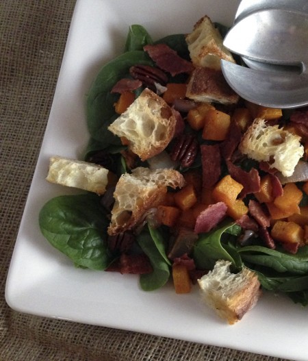 spinach salad with maple-roasted butternut squash, bacon, and pecans