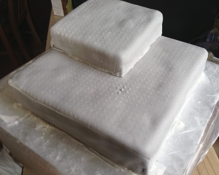 cake covered in lego textured marshmallow fondant
