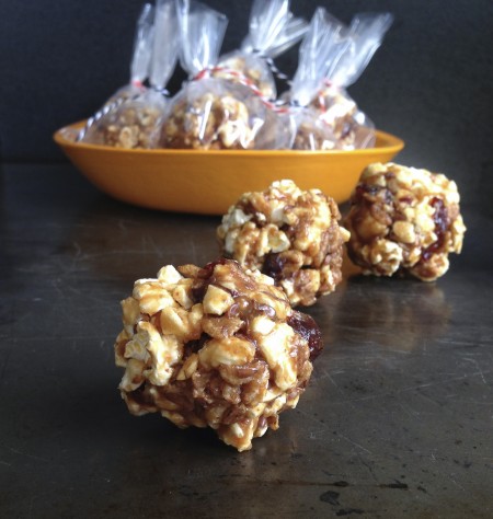 easy, healthy popcorn balls made with honey, peanut butter, and dried fruit