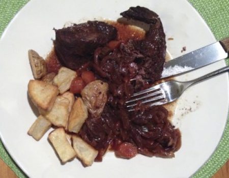 recipe for fork-tender, umami-packed pot roast in red wine, slow cooked